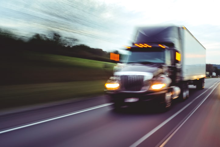 Big rig 18-wheeler semi-truck motion blur
