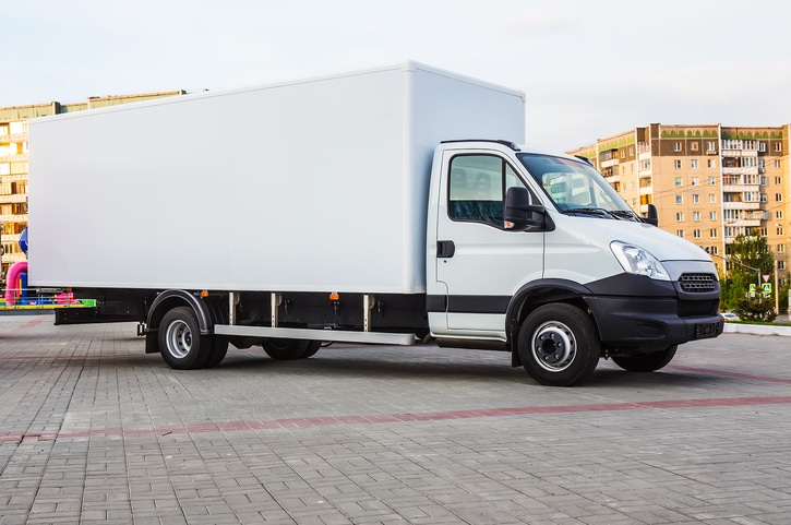 White truck with a container