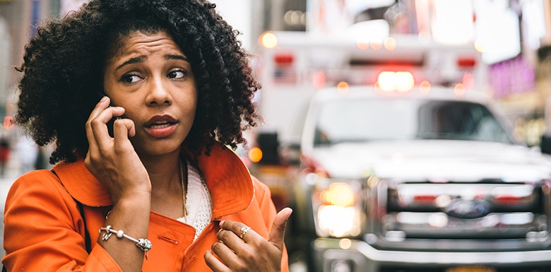 woman on phone after a car accident