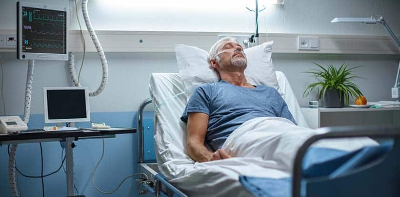 Man in hospital bed